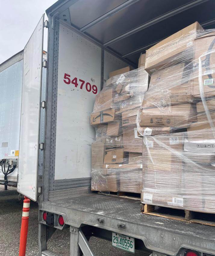 Load image into Gallery viewer, Amazon general merchandise medium-sized monster pallets truckload with tall shrink-wrapped loads