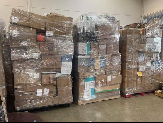 Black-wrapped Amazon liquidation truckload with mixed general merchandise returns