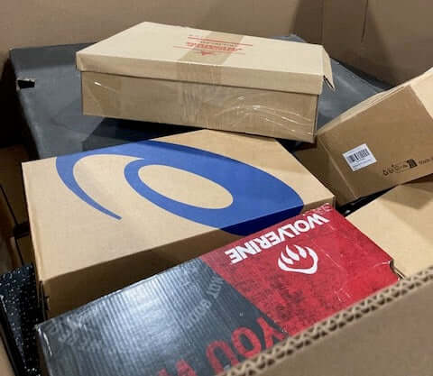 Truckload of Amazon footwear pallets including overstock and return shoes for resale