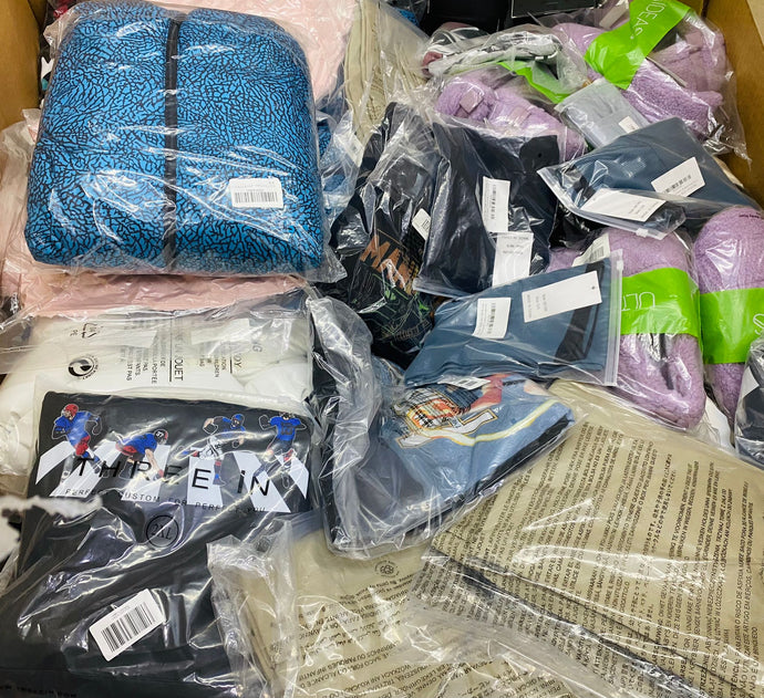 Amazon truckload filled with new overstock clothing in assorted sizes and styles